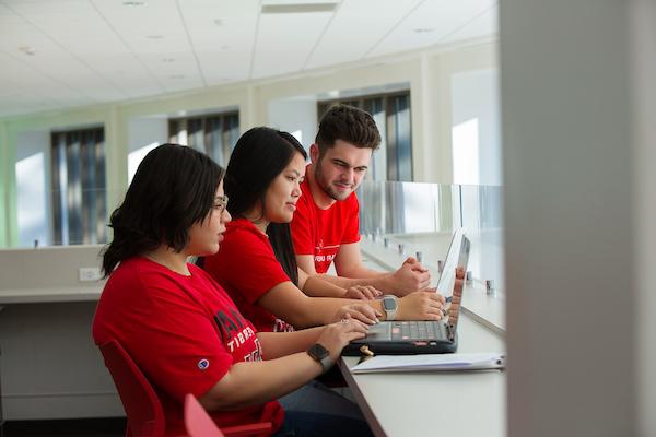 Students Over Computer